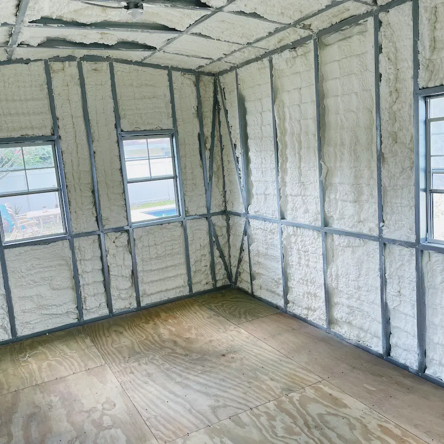 Closed-cell spray foam insulation applied to wall cavities in a residential project in Decatur
